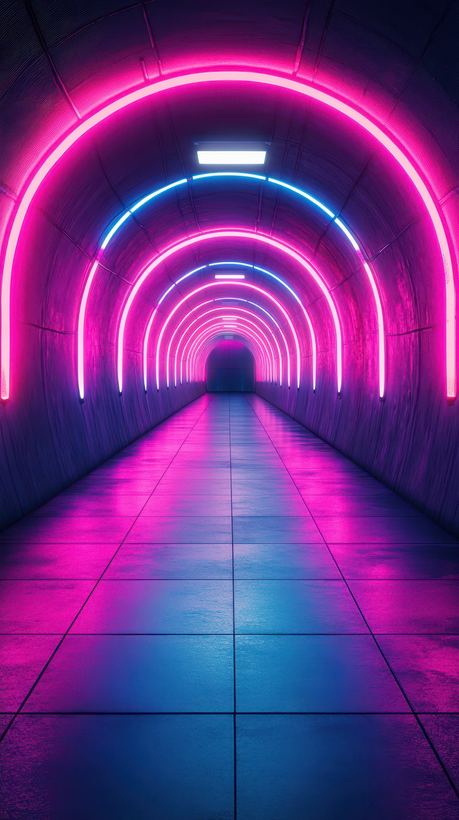 Vibrant neon lights illuminate a modern tunnel at night creating a stunning visual experience in urban exploration